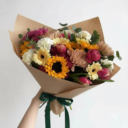 RAMO DE GIRASOLES Y FLORES PASTEL